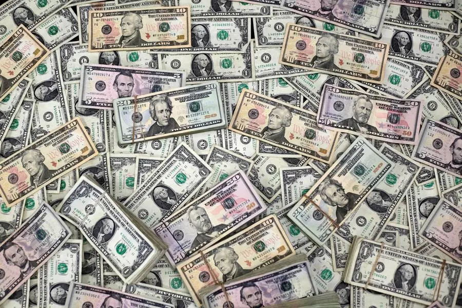 FILE PHOTO: U.S. dollar banknotes are seen in this photo illustration taken February 12, 2018. REUTERS/Jose Luis Gonzalez/Illustration/File Photo , Reuters/REUTERS