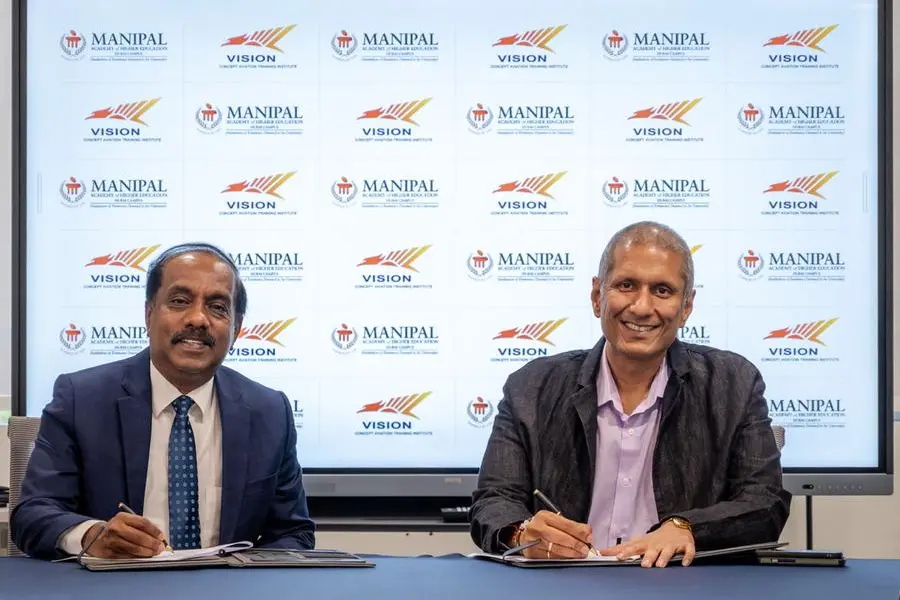 Dr. Sudhindra Shamanna, Academic President, MAHE Dubai and Mahesh Choudhary, CEO of Vision Concept Aviation Training Institute sign MoU. Image Courtesy: MAHE