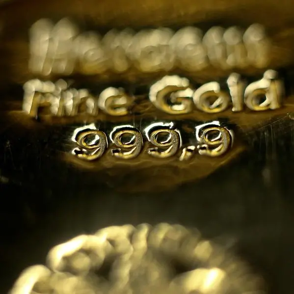 Gold slips on US-China trade talk hopes; traders eye Fed policy