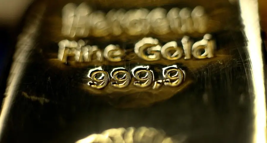 Gold slips on US-China trade talk hopes; traders eye Fed policy