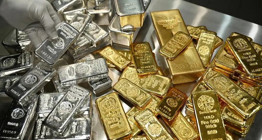 Gold holds above $4,000; silver hits record high