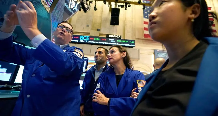 Markets swing after Wall St losses as traders weigh US rates outlook