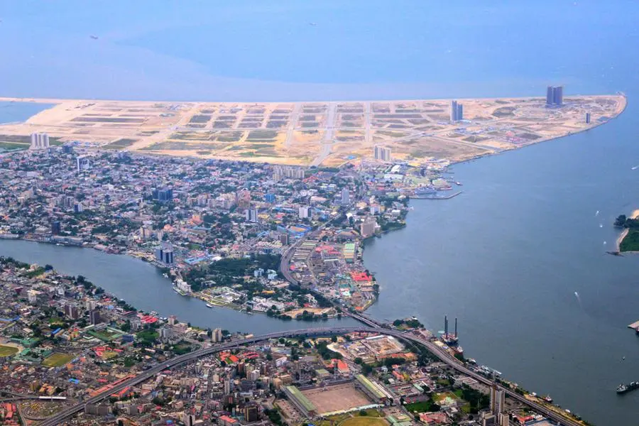 Lagos, Nigeria: the megalopolis from the air - Lagos island and Victoria Island separated by Five Cowrie Creek - Eko Atlantic City land reclamation - Ahmadu Bello Way, Eti-Osa - Lagos Lagoon, Gulf of Guinea, Atlantic Ocean in the background. Image used for illustrative purpose. Getty Images