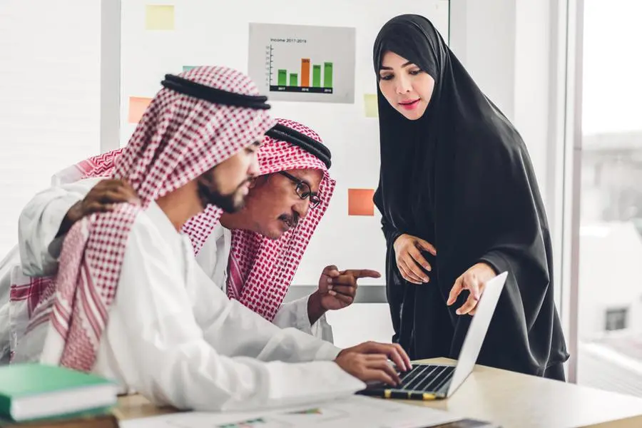 Successful group of arabic business discussing and working with laptop computer.creative arab business people planning and brainstorm in modern office.Teamwork concept. Image used for illustrative porpose. Getty Images