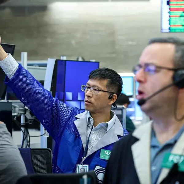 Stocks slip as markets eye US data barrage, Japan PM's meet with BOJ chief