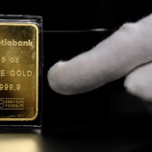 Gold tumbles below $5,000, dragging other metals lower