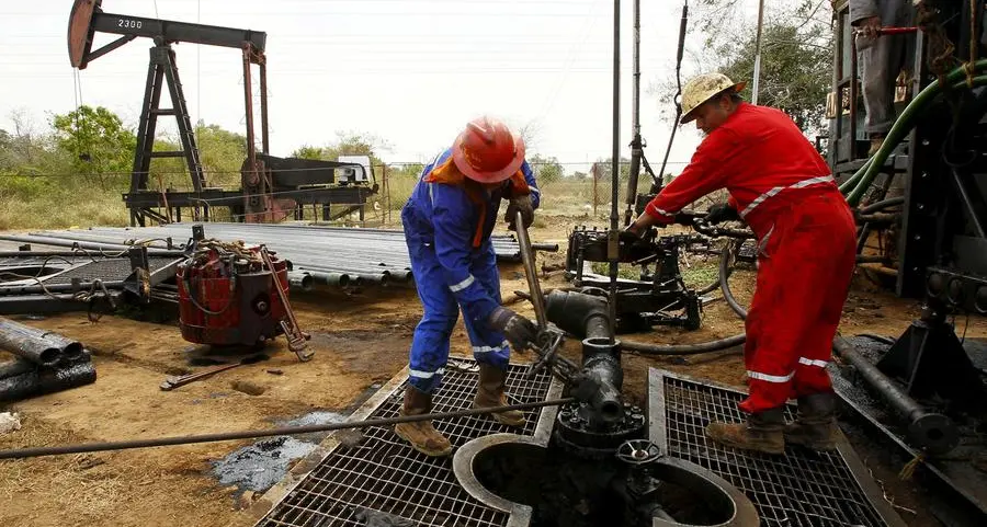 Investors worry Big Oil could reduce share buybacks as crude prices slump