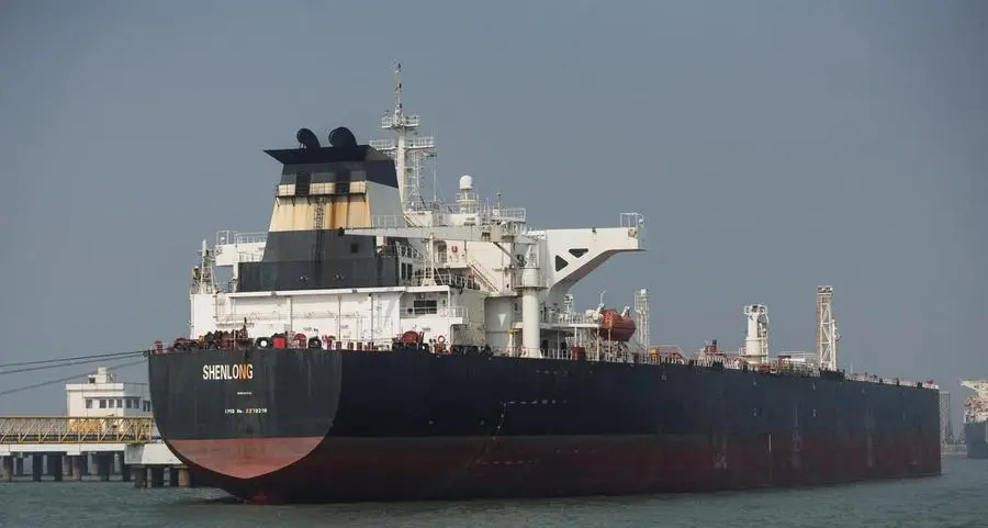 Oman working to secure Hormuz shipping, warns war will worsen economic fallout, foreign minister says