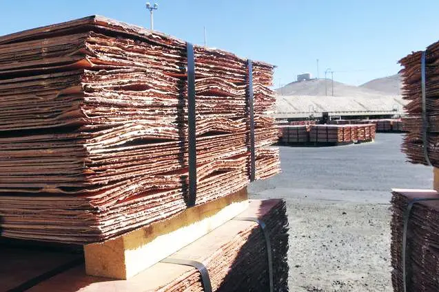 Copper edges up on dollar weakness, but clouds loom over demand outlook