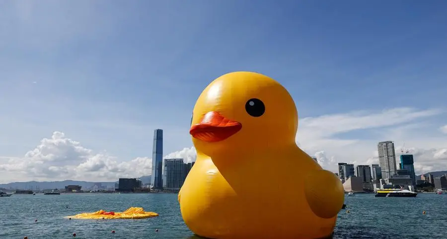 One of two giant rubber ducks in Hong Kong harbour deflates