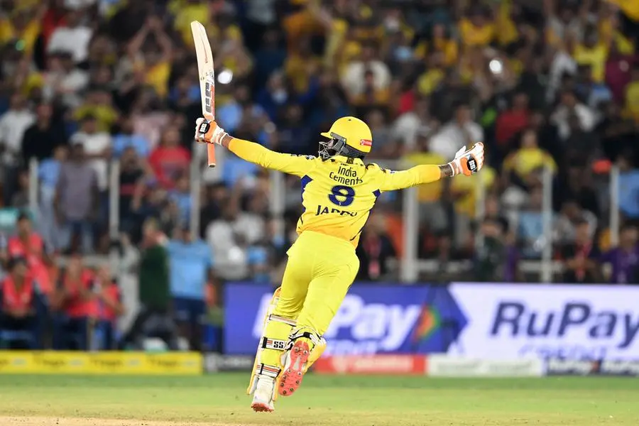 Chennai Super Kings' Ravindra Jadeja celebrates his team's win at the end of during the Indian Premier League (IPL) Twenty20 final cricket match between Gujarat Titans and Chennai Super Kings at the Narendra Modi Stadium in Ahmedabad on May 30, 2023. (Photo by Sajjad HUSSAIN / AFP)