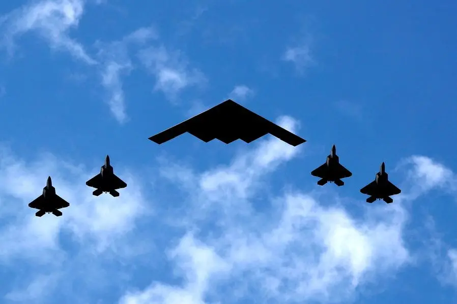 FILE PHOTO: A U.S. Air Force B-2 Spirit Stealth Bomber (C) is flanked by 4 U.S. Marine Corps F-35 fighters during a flyover of military aircraft down the Hudson River and New York Harbor past York City, and New Jersey, U.S. July 4, 2020. REUTERS/Mike Segar/File Photo Image used for illustrative purpose. , Reuters
