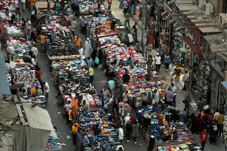 A view shows a crowd and shops at Al Ataba market, following the coronavirus disease (COVID-19) outbreak, in Cairo, Egypt July 16, 2020. REUTERS/Mohamed Abd El Ghany. , Reuters Images