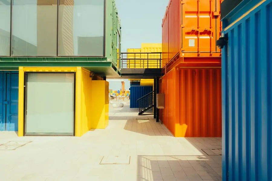 Recycled colorful harbor containers stack in a cool architecture in Doha. Image used for illustrative purpose. Getty Images , Getty Images