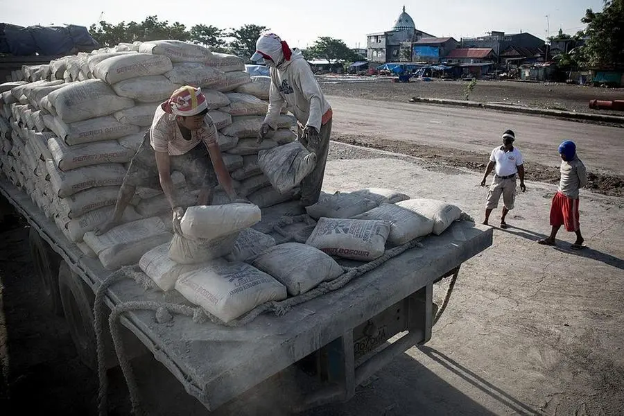 <p>Image used for illustrative purpose only. MAKASSAR, INDONESIA - APRIL 30: Indonesian porters move sacks of cement to be loaded on a traditional wooden ship at Paotere Harbor on April 30, 2014 in Makassar, Indonesia.&nbsp;</p>\\n , Getty Images/Getty Images