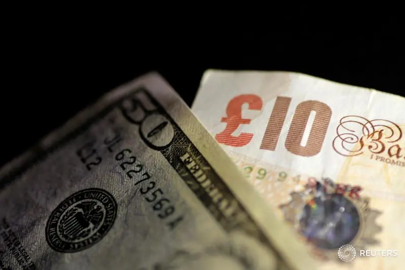 British Pound Sterling and U.S. Dollar notes are seen in this June 22, 2017 illustration photo. , Reuters Images/Thomas White/Illustration