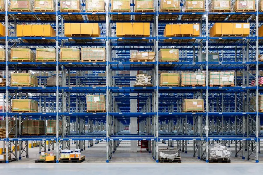Large hangar warehouse of industrial and logistics companies. Long shelves with a variety of boxes. Image used for illustrative purpose. Getty Images , Getty Images