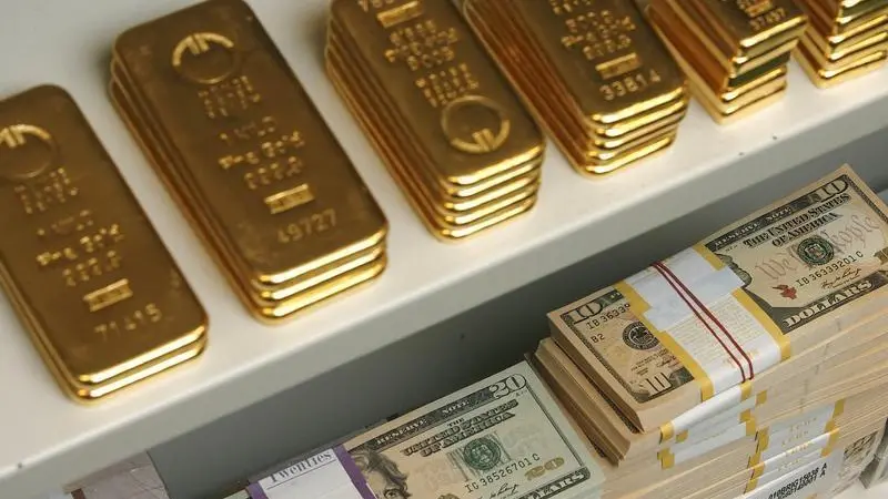 Gold prices ease from one-week high as US dollar strengthens