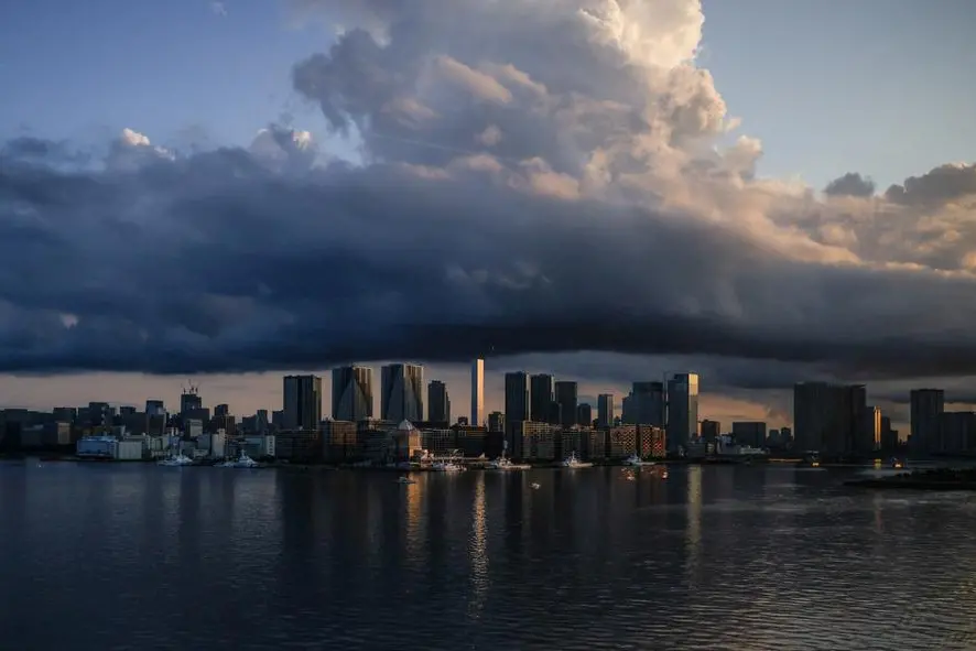 FILE PHOTO: City skyline and harbour are seen at sunrise during the Tokyo 2020 Olympic Games in Tokyo, Japan July 24, 2021. REUTERS/Maxim Shemetov/File Photo Image for illustrative purpose , Reuters