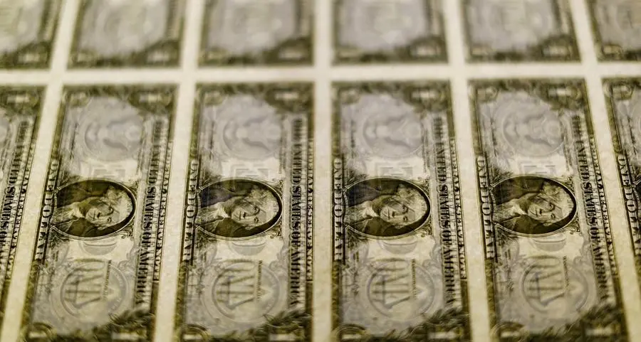 Dollar jumps, traders pare rate cut bets after strong jobs report