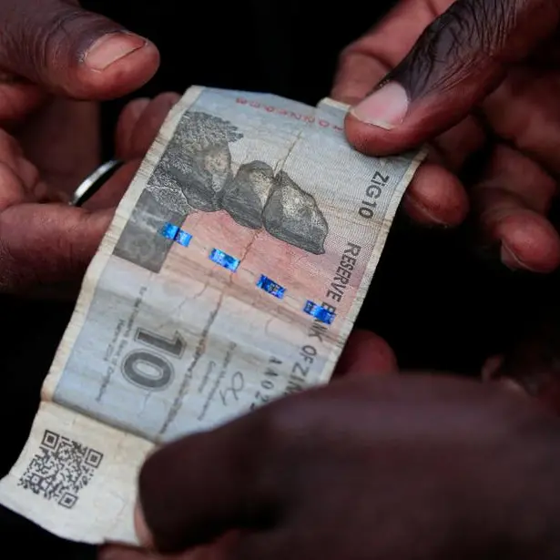 Zimbabwe's president vows to implement measures to stop currency slide