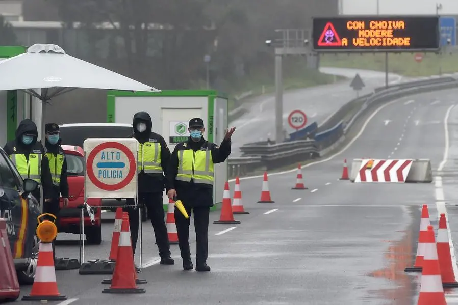 Two police among 6 killed as truck rams into Spanish checkpoint