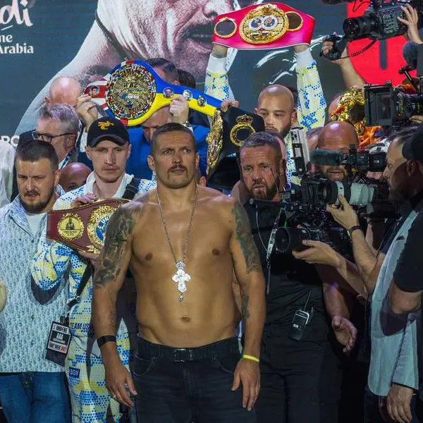 Oleksandr Usyk claims undisputed heavyweight title in 'Ring of Fire' match in Riyadh