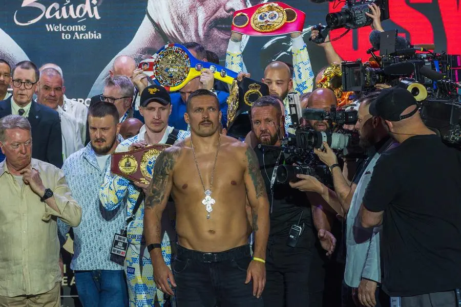 Oleksandr Usyk claims undisputed heavyweight title in 'Ring of Fire' match in Riyadh