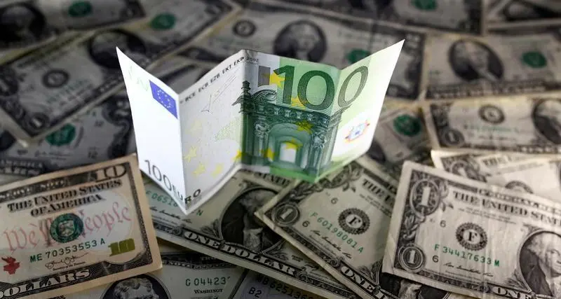 Euro edges down, dollar hovers around two-year high