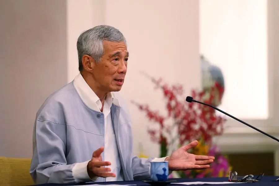 Singapore PM Lee: minister under graft probe barred from duty until further notice