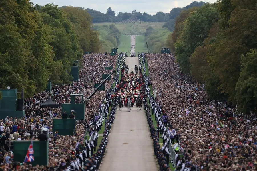 The hearse travels along the Long Walk as it makes its way to Windsor Castle, on the day of the state funeral and burial of Britain's Queen Elizabeth, in Windsor, Britain, September 19, 2022. REUTERS/Carl Recine
