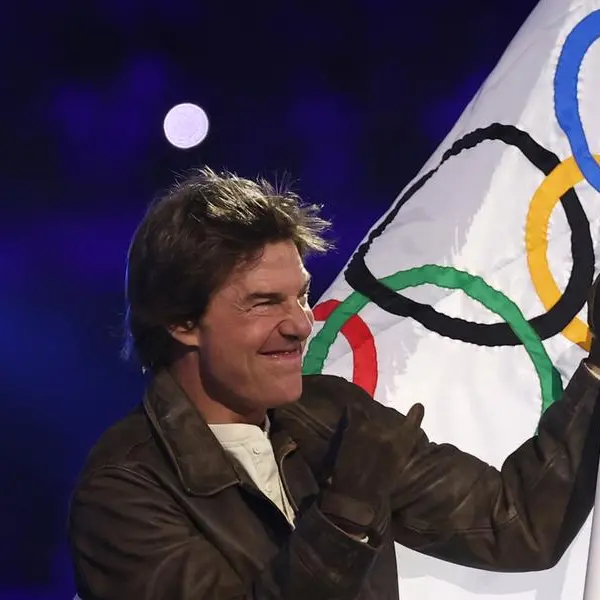 Tom Cruise abseils into Olympic closing ceremony