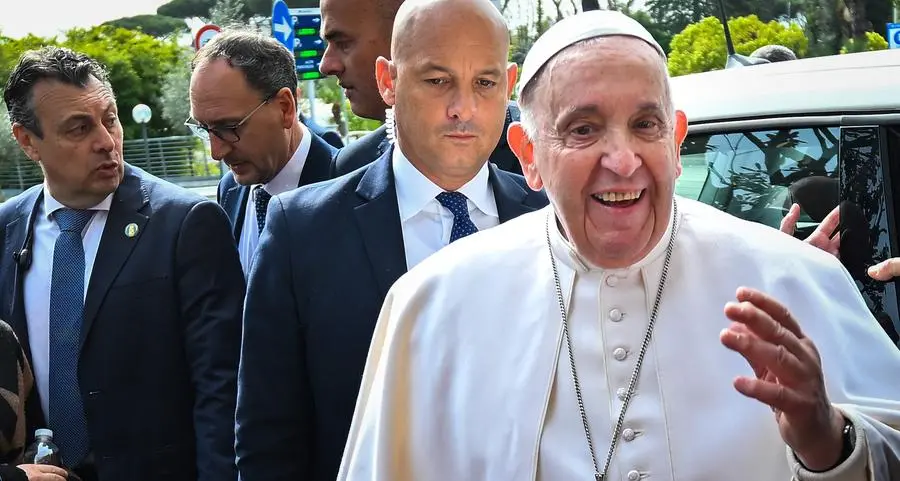 Pope Francis leaves hospital, quips 'I am still alive'