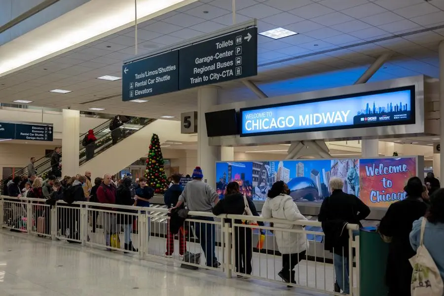 CHICAGO, IL - DECEMBER 27: Travelers search for their luggage at the Southwest Airlines Baggage Claim at Midway Airport on December 27, 2022 in Chicago, Illinois. A snowstorm and severe cold front that hit Chicago before the holiday weekend stranded many travelers and their luggage. Southwest Airlines has canceled approximately 5,400 flights in less than 48 hours due to a variety of issues including this year\\u2019s historic winter storm and scheduling complications involving crew members. On Monday, Southwest had 10 times more flights canceled than Delta Airlines, which had the second most cancellations nationwide this holiday season. Jim Vondruska/Getty Images/AFP (Photo by Jim Vondruska / GETTY IMAGES NORTH AMERICA / Getty Images via AFP)