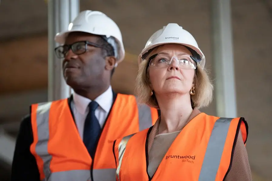 British Prime Minister Liz Truss and Chancellor of the Exchequer Kwasi Kwarteng visit a construction site for a medical innovation campus, on day three of the Conservative Party annual conference at the International Convention Centre in Birmingham, Britain October 4, 2022. Stefan Rousseau/Pool via REUTERS , Reuters