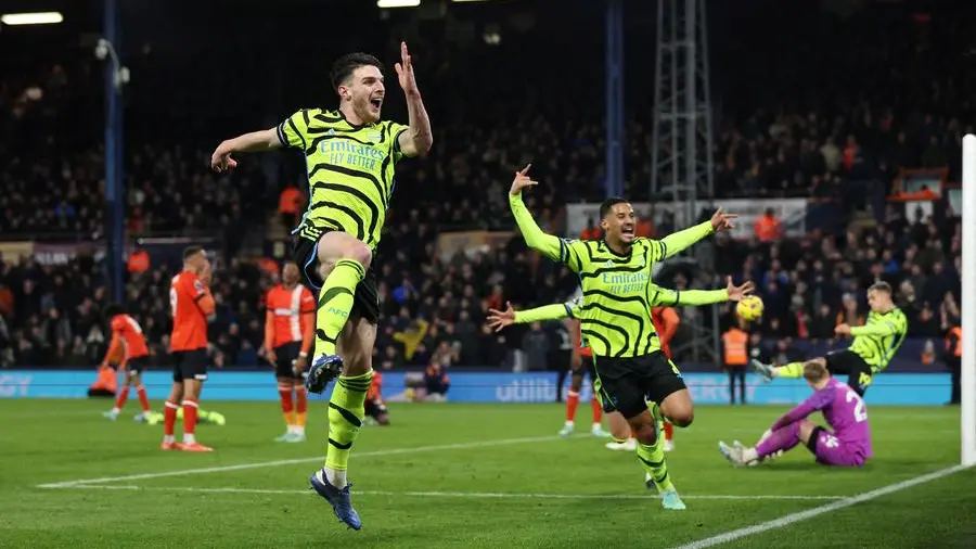 Arsenal go five clear as Rice seals seven-goal thriller at Luton