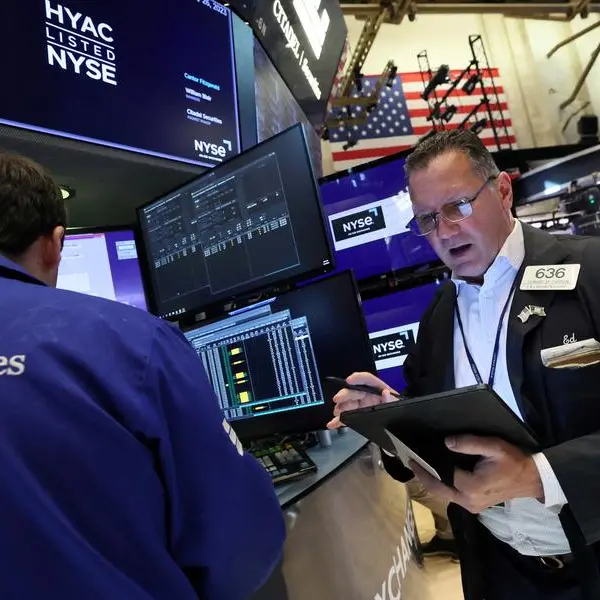 Shares rise, dollar drops vs yen after BOJ hint of exit from negative rates