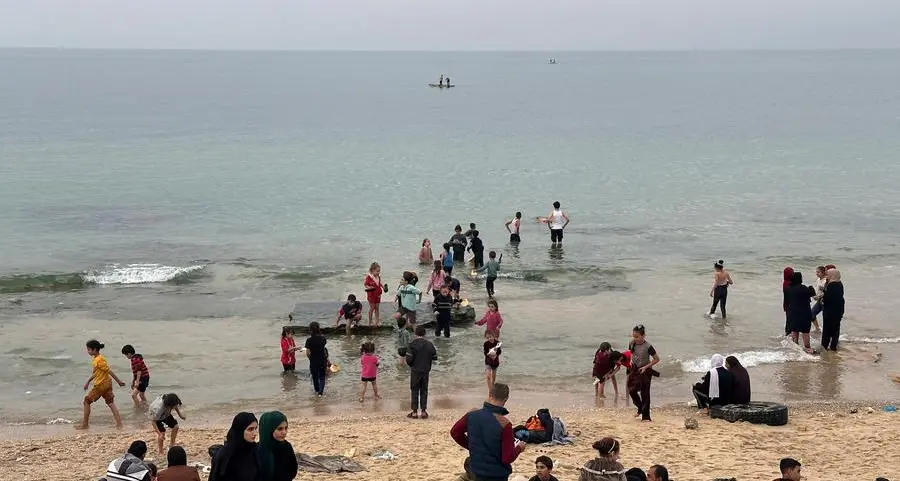 Tears and laughter on Gaza beach as children get break from war
