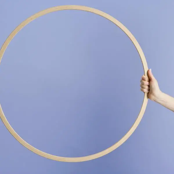 Woman spins 8 hula hoops on fire simultaneously to break Guinness World Record