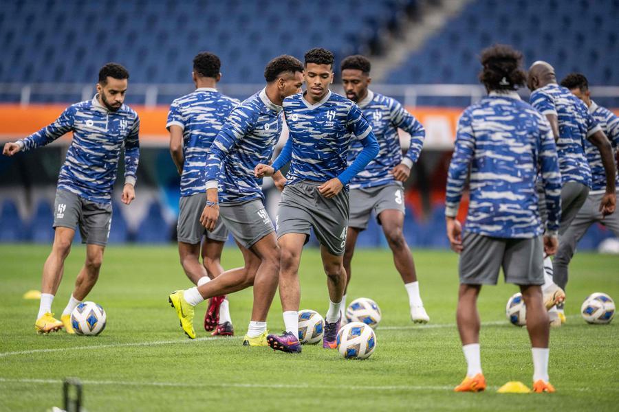 Players of Saudi Arabia's Al Hilal receive the runner-up medals during the  award ceremony after the AFC Champions League final match at Saitama  Stadium in Saitama, near Tokyo, Saturday, May 6, 2023.