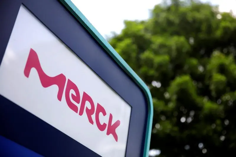 The Merck logo is seen at an office building in Singapore January 17, 2018. REUTERS/Thomas White - RC1AAAAB57F0 , Reuters Images