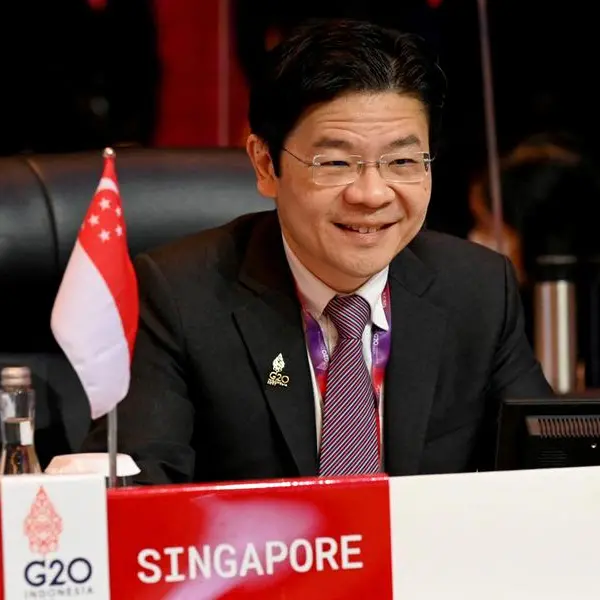 Singapore's guitar-playing new PM prefers 'incremental' change