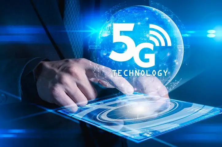 The abstract image of businessman using a smartphone overlay with 5g hologram. Element of this image furnished by Nasa. the concept of 5G, communication, network, connection, internet of things. , Getty Images/Getty Images