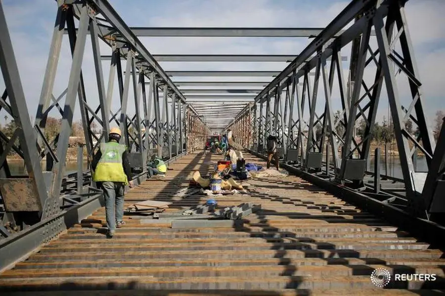 Image used for illustrative purpose. Workers repair a bridge in Mosul, Iraq January 28, 2018. Khalid Al-Mousily, Reuters , Reuters Images