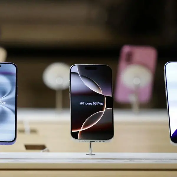 UK retail sales unexpectedly rise, boosted by new iPhone