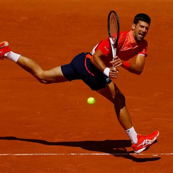 Djokovic breezes into French Open second round