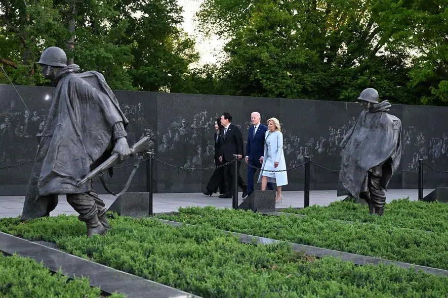 US President Joe Biden, First Lady Jill Biden, South Korea President Yoon Suk Yeol and First Lady Kim Keon Hee, visit the Korean War Veterans Memorial in Washington, DC on April 25, 2023. (Photo by Jim WATSON / AFP) , Agence France-Presse (AFP)