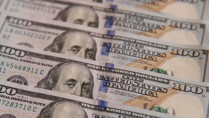 Dollar softens but heads for weekly gain amid Middle East uncertainty