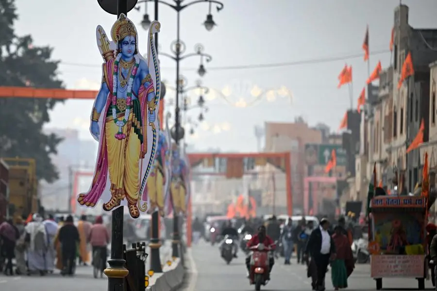 A cut-out of Hindu deity Ram is installed on light poles in Ayodhya on January 21, 2024, on the eve of consecration ceremony of a Ram temple. India's Prime Minister Narendra Modi will on January 22 inaugurate a temple that embodies the triumph of his muscular Hindu nationalist politics, in an unofficial start to his re-election campaign this year. (Photo by Money SHARMA / AFP)