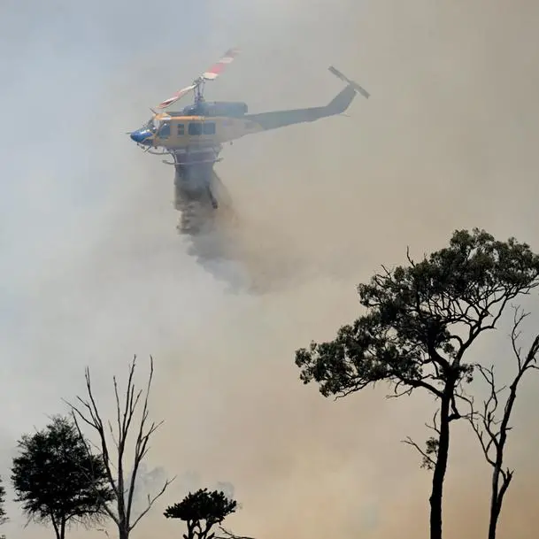 Firefighters battle bushfires in Australia's Perth in rare spring heatwave